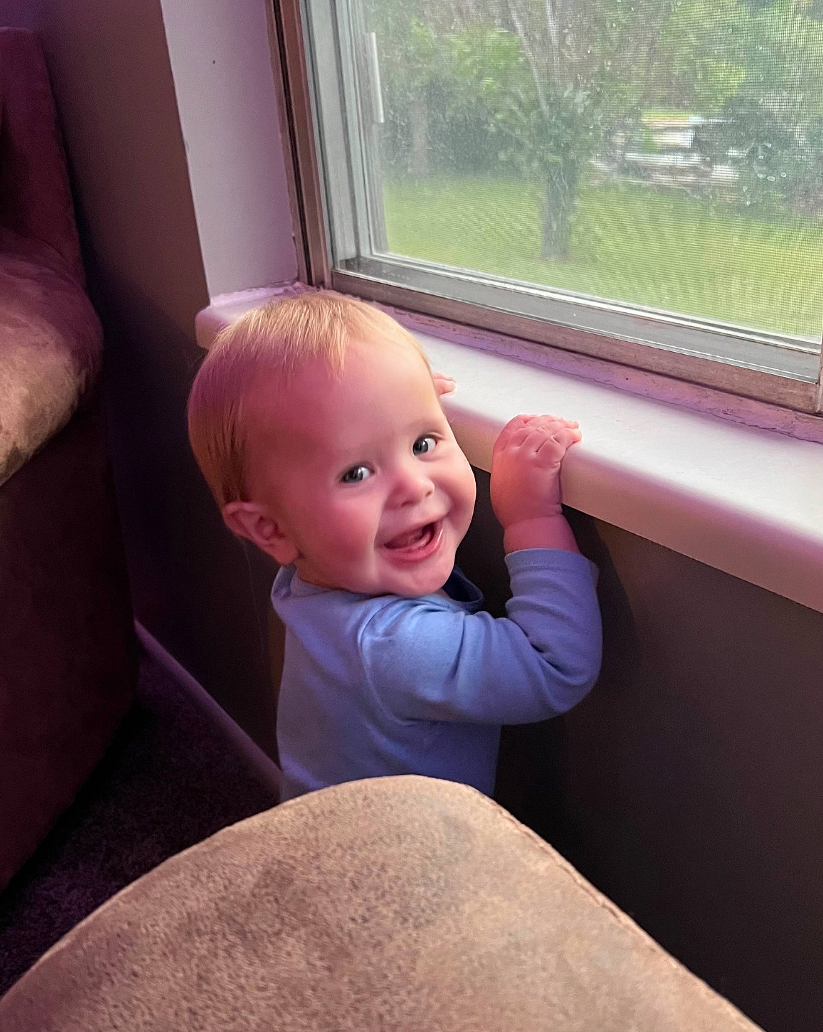 Mccoy is registered to the contest to win money with this photo: auto_part, automotive_exterior, baby, beauty, comfort, face, family_car, happy, human_body, light, luxury_vehicle, person, plant, smile, thumb, tints_and_shades, toddler, tree, vehicle_door, window