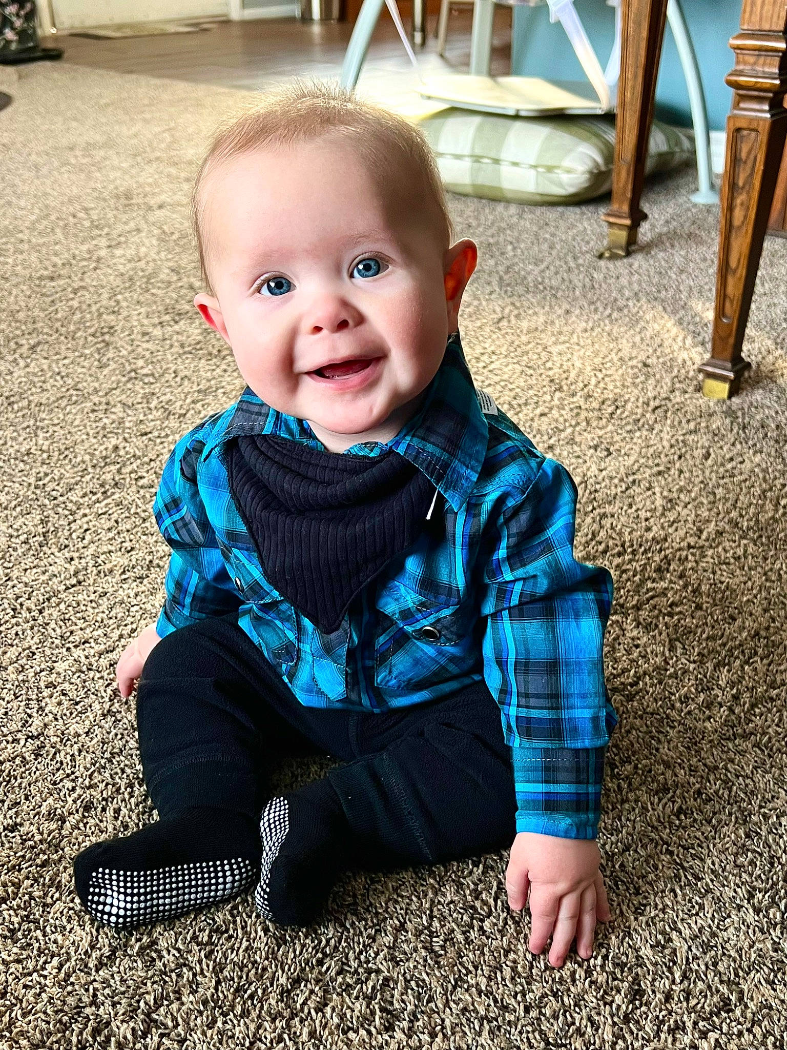 Mccoy is registered to the contest to win money with this photo: baby, baby_toddler_clothing, blue, chair, cheek, child, electric_blue, flooring, fun, grass, happy, iris, pattern, person, sitting, skin, sleeve, smile, toddler, white