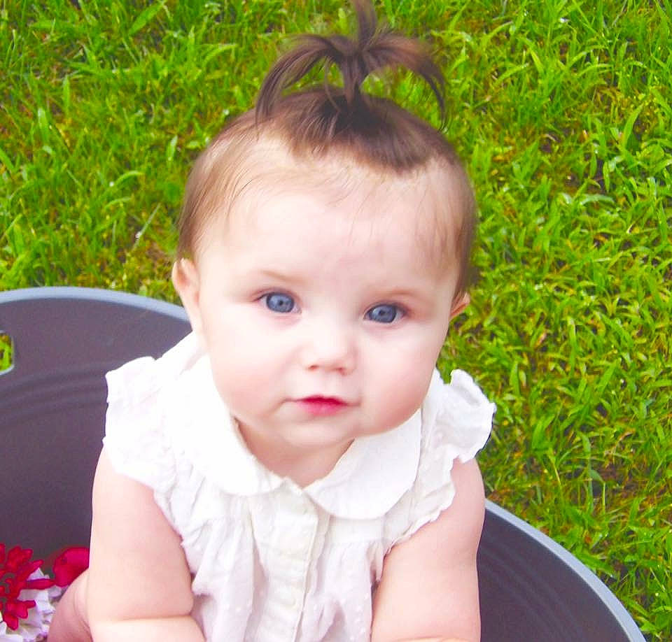 Emmarie is registered to the contest to win money with this photo: baby, beauty, brown_hair, cheek, child, child_model, ear, eye, face, grass, hair, hairstyle, head, iris, lip, nose, person, product, skin, summer