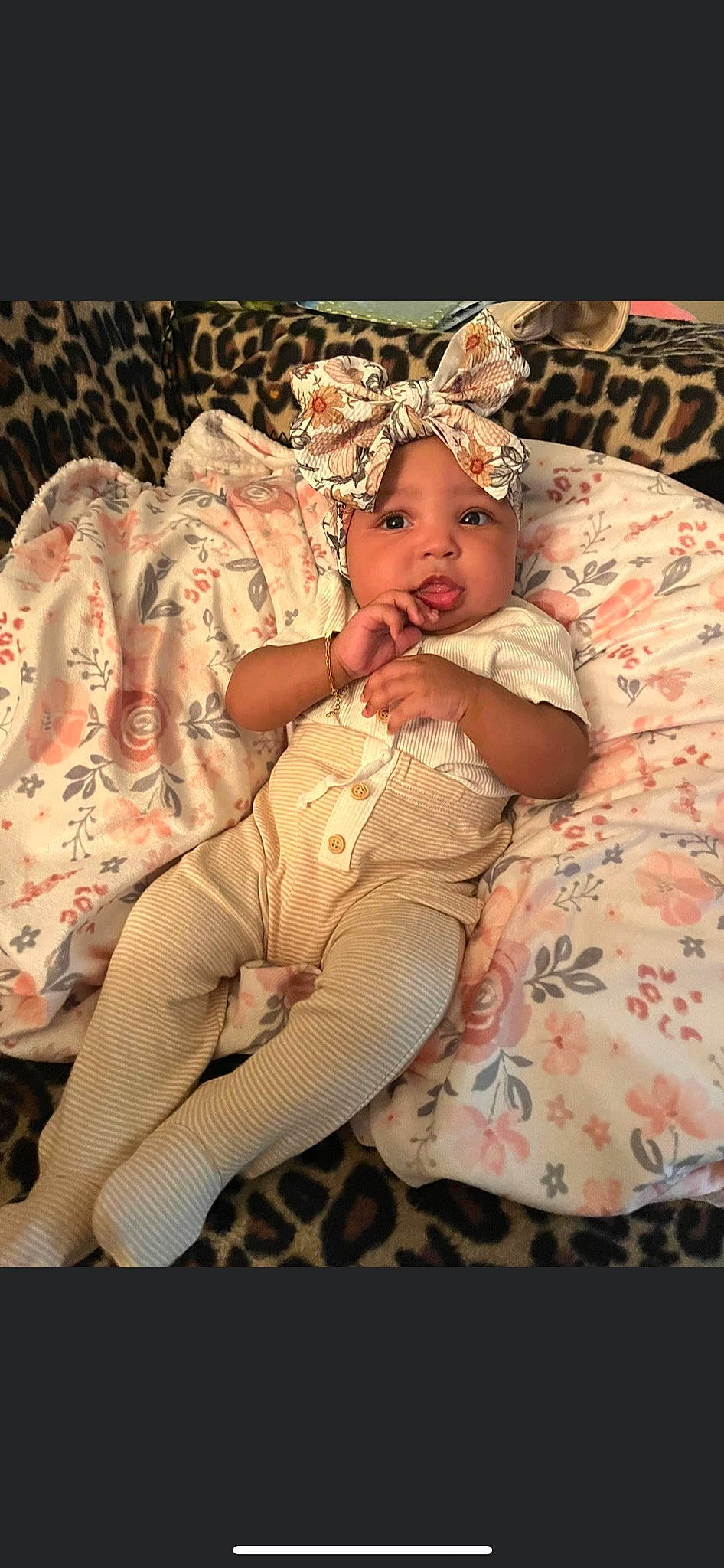 Stormi is registered to the contest to win money with this photo: abdomen, baby, comfort, event, eye, face, fashion_accessory, fashion_design, flash_photography, happy, hat, headpiece, headwear, human_body, human_leg, jewellery, pattern, person, thigh, toddler