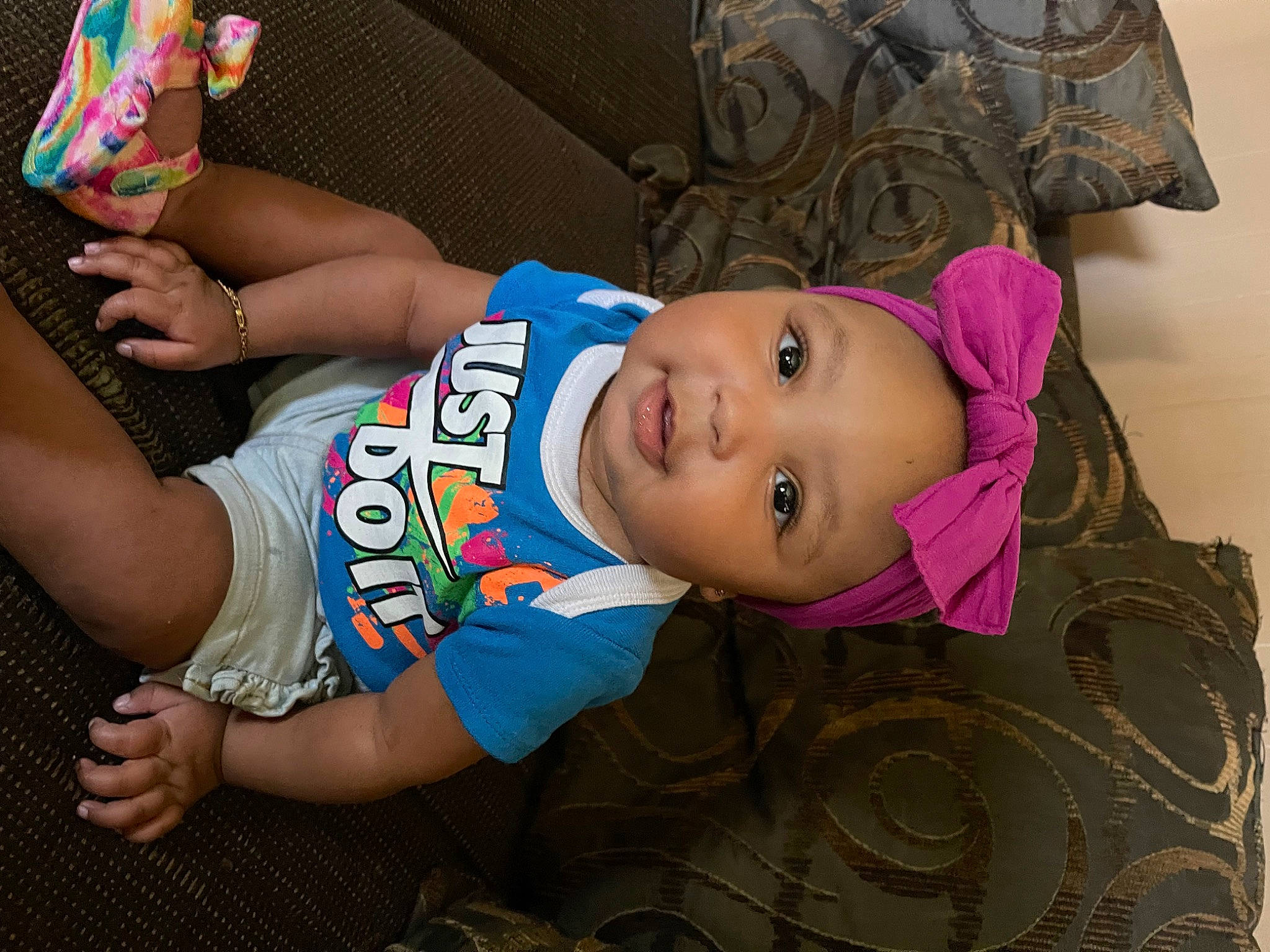 Stormi joined the competition — help win amazing prizes! baby, baby_toddler_clothing, cheek, child, face, fashion_accessory, foot, fun, happy, hat, head, headwear, human_body, human_leg, mouth, nose, person, sitting, skin, smile