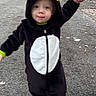Luka joined the competition — help win amazing prizes! child, toddler, penguin_costume, yellow_feet, hooded_outfit, walking, holding_hands, outdoor, street, pavement, adult_hands, autumn, trees, daylight, cute, costume, playful, fun, person, casual