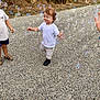 Solann a rejoint le concours — aidez-le/la à gagner de superbes lots ! child, toddler, bubbles, outdoor, gravel, white_shirt, shorts, running, happy, nature, grass, dry_bushes, footwear, play, fun, summer, friends, casual_clothing, daytime, smile