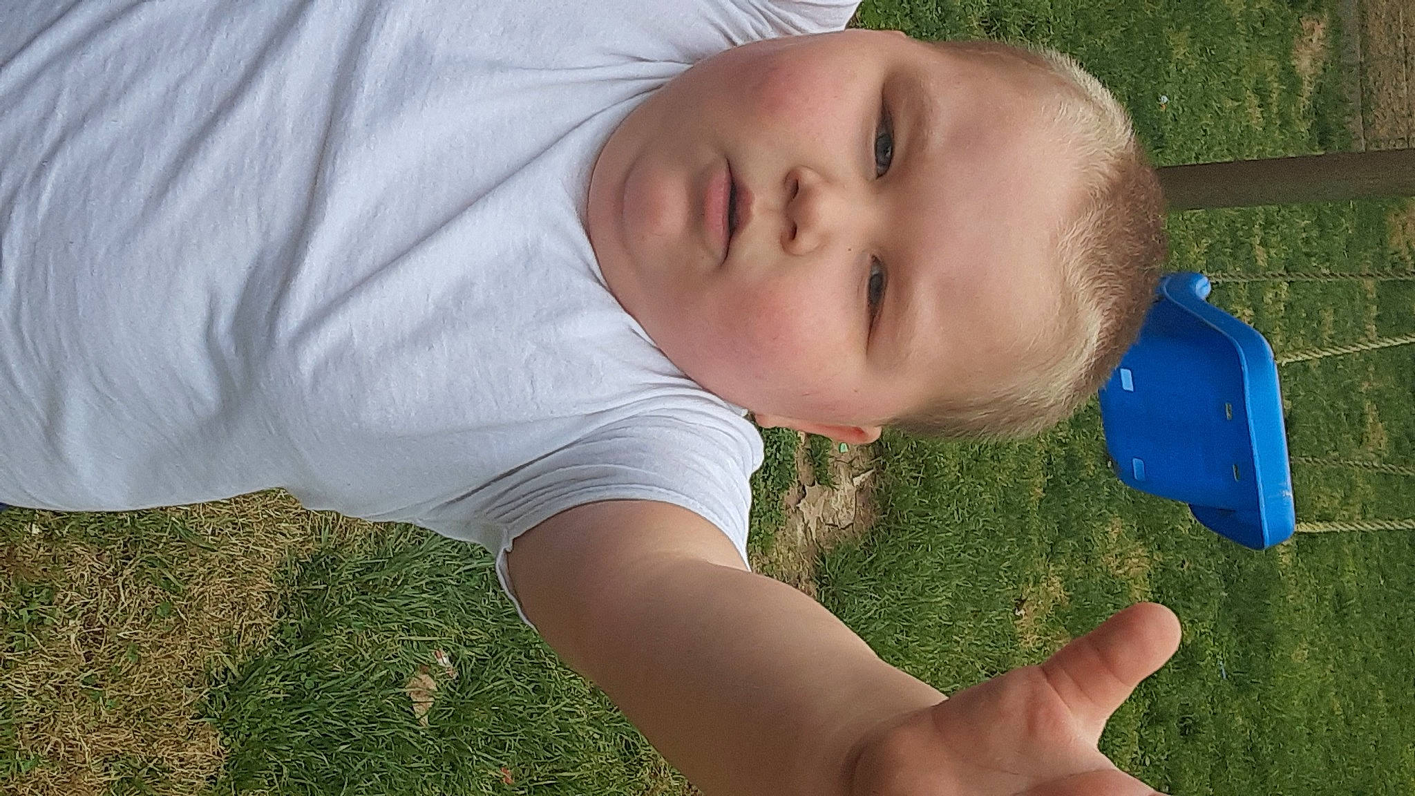 Remington joined the competition — help win amazing prizes! arm, baby, baby_toddler_clothing, child, finger, fun, grass, grass_family, grassland, hand, happy, human_body, lawn, meadow, nose, people_in_nature, person, plant, smile, toddler