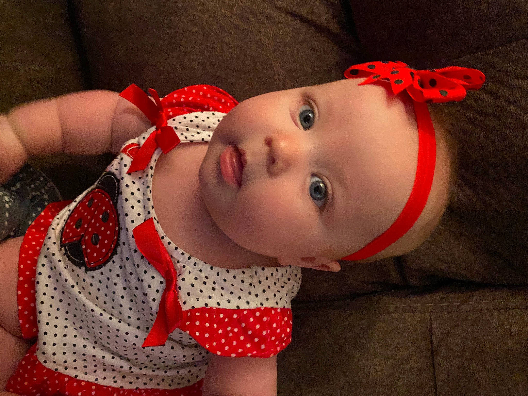 Alaysia is registered to the contest to win money with this photo: baby, cheek, child, design, ear, hair_accessory, headgear, headwear, lip, pattern, person, polka_dot, red, skin, toddler