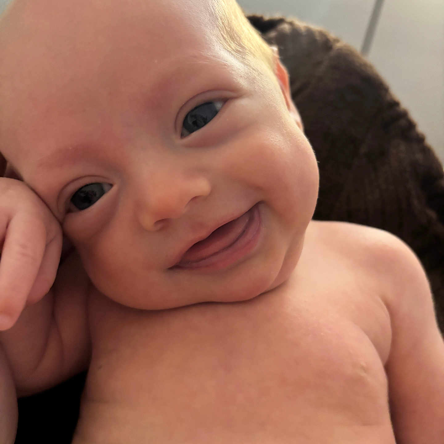 Grayson joined the competition — help win amazing prizes! newborn, baby, infant, child, smiling, happy, face, portrait, close_up, eyes, blond_hair, bare_shoulders, sitting, cuddling, indoors, warm_lighting, knitted_blanket, soft_focus, family, adorable