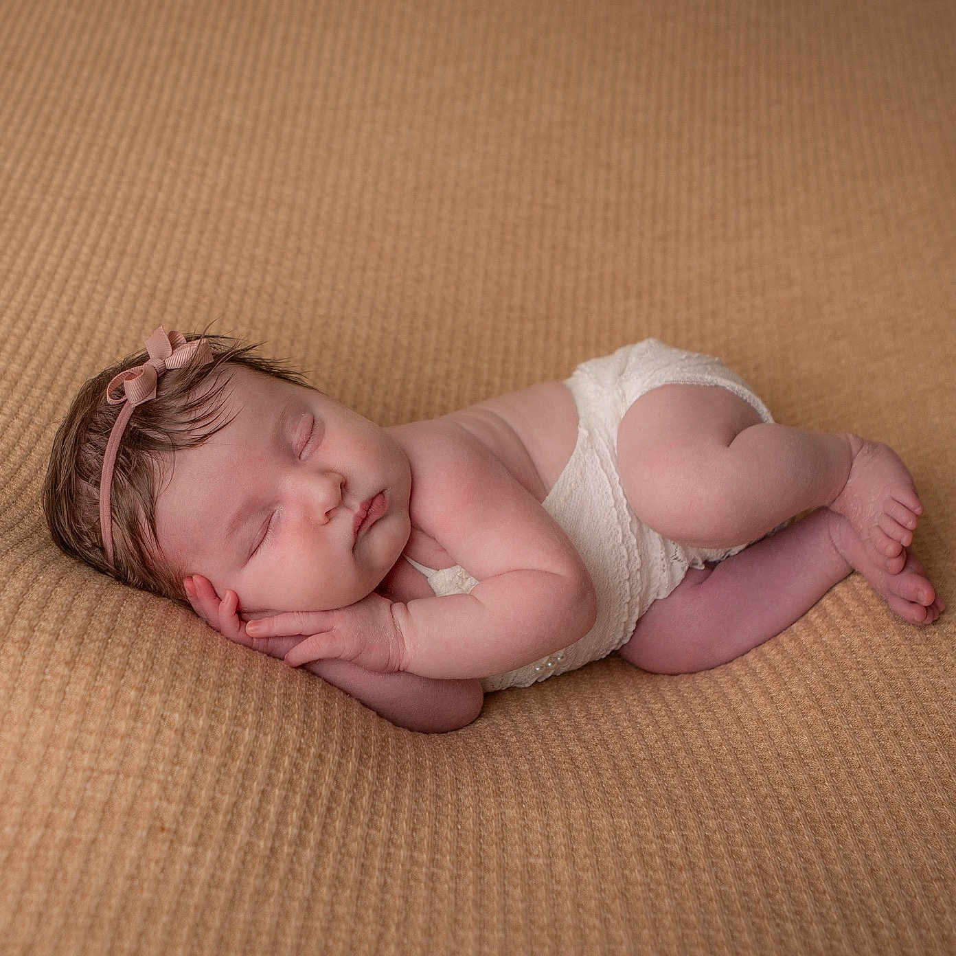 Ivy is registered to the contest to win money with this photo: baby, bodypart, bonnet, clothing, diaper, face, finger, hand, happy, hat, head, newborn, person, photography, portrait, sleeping, smile