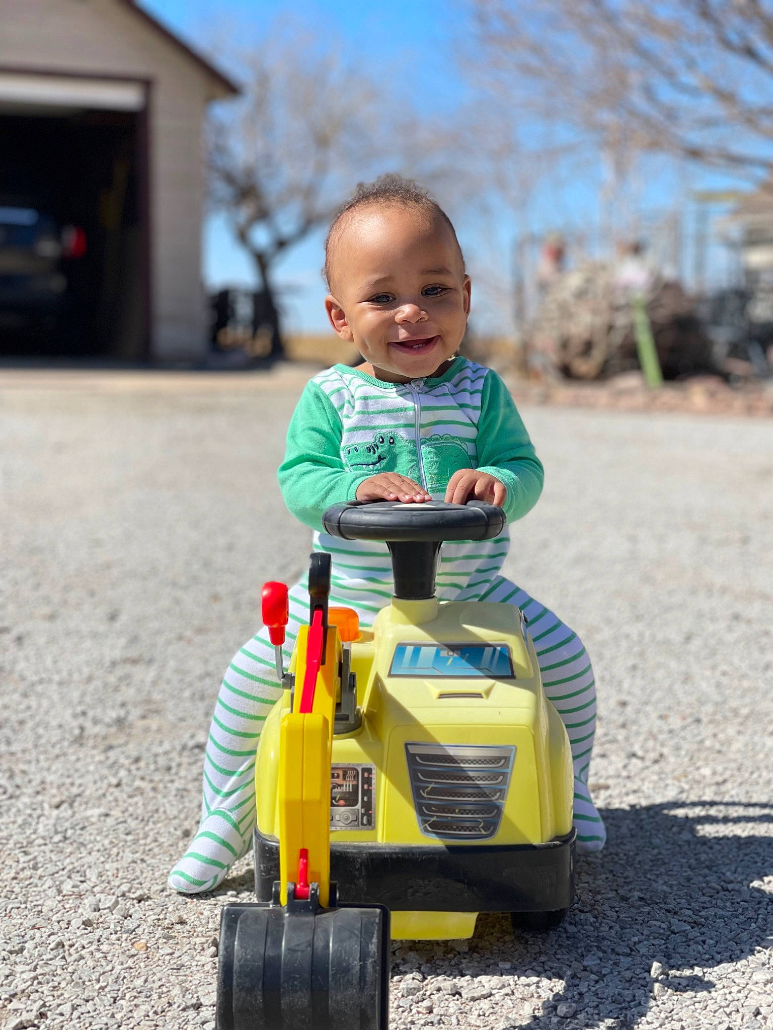 Jordyn joined the competition — help win amazing prizes! automotive_design, automotive_lighting, automotive_tire, automotive_wheel_system, baby, grass, happy, joy, motor_vehicle, person, recreation, riding_toy, rolling, sky, smile, tire, toddler, toy, travel, tree