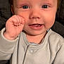 baby, child, clothing, cute, expression, eyes, fabric, face, fist, hair, hand, happy, head, indoors, infant, onesie, portrait, skin, smile, young
