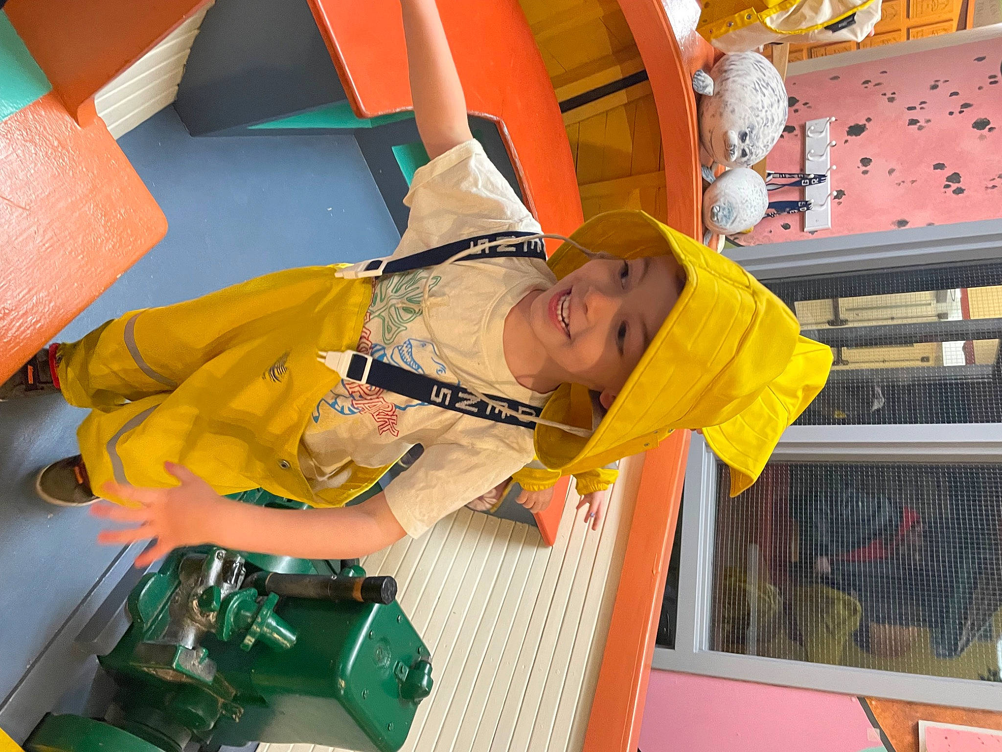 Anderson joined the competition — help win amazing prizes! baby, child, fun, happy, hat, headwear, helmet, joy, leisure, orange, person, play, recreation, room, smile, toddler, vacation