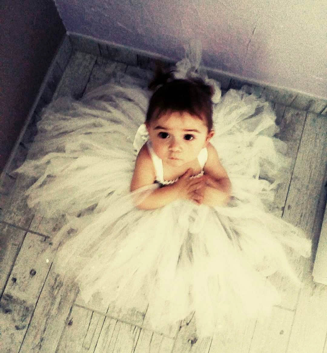 Vénicia participe au concours pour gagner de l'argent avec cette photo : baby, ballet_tutu, beauty, child, cloud, costume, dress, eye, face, floor, hair, hairstyle, head, iris, long_hair, person, photograph, photography, skin, toddler