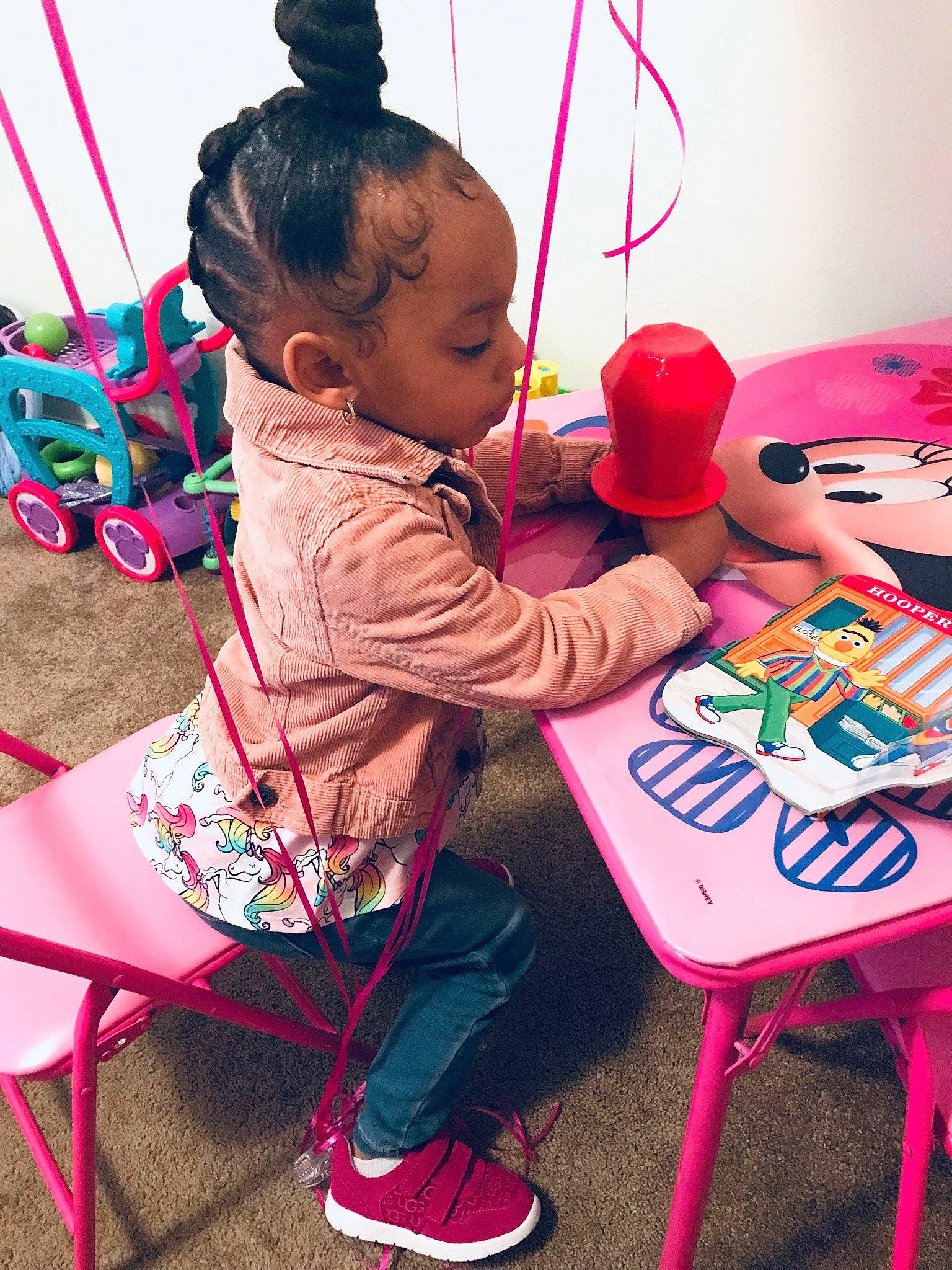 Londynn is registered to the contest to win money with this photo: baby, baby_toddler_clothing, black, chair, child, event, fun, happy, leisure, magenta, people, person, pink, play, red, sharing, snapshot, table, toddler, tree