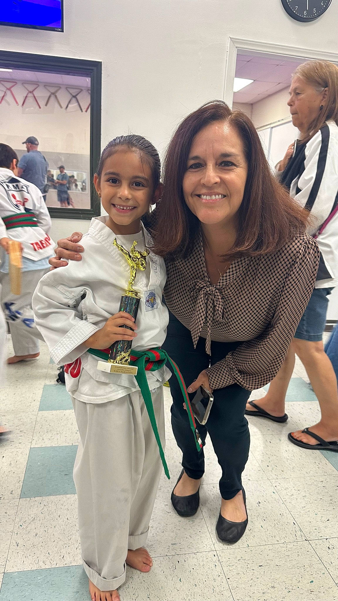 Arielle joined the competition — help win amazing prizes! contact_sport, event, fashion_design, flip_flops, footwear, fun, hair, hairstyle, happy, head, human, japanese_martial_arts, joy, martial_arts, martial_arts_uniform, person, sandal, shoe, smile, sneakers