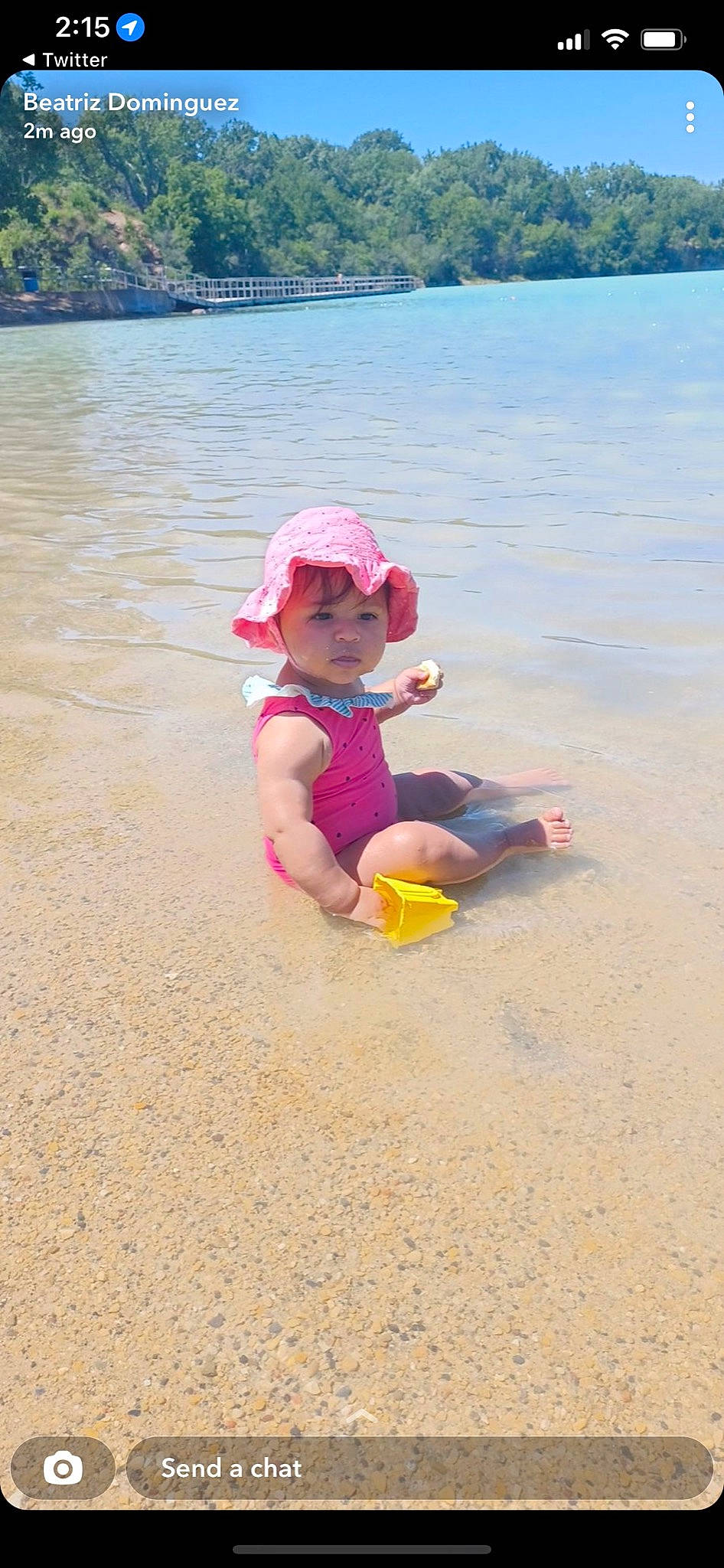 Analia joined the competition — help win amazing prizes! baseball_cap, beach, cap, child, fun, hat, headwear, lake, landscape, leisure, natural_environment, person, recreation, sand, shore, sky, summer, sun_hat, toddler, travel