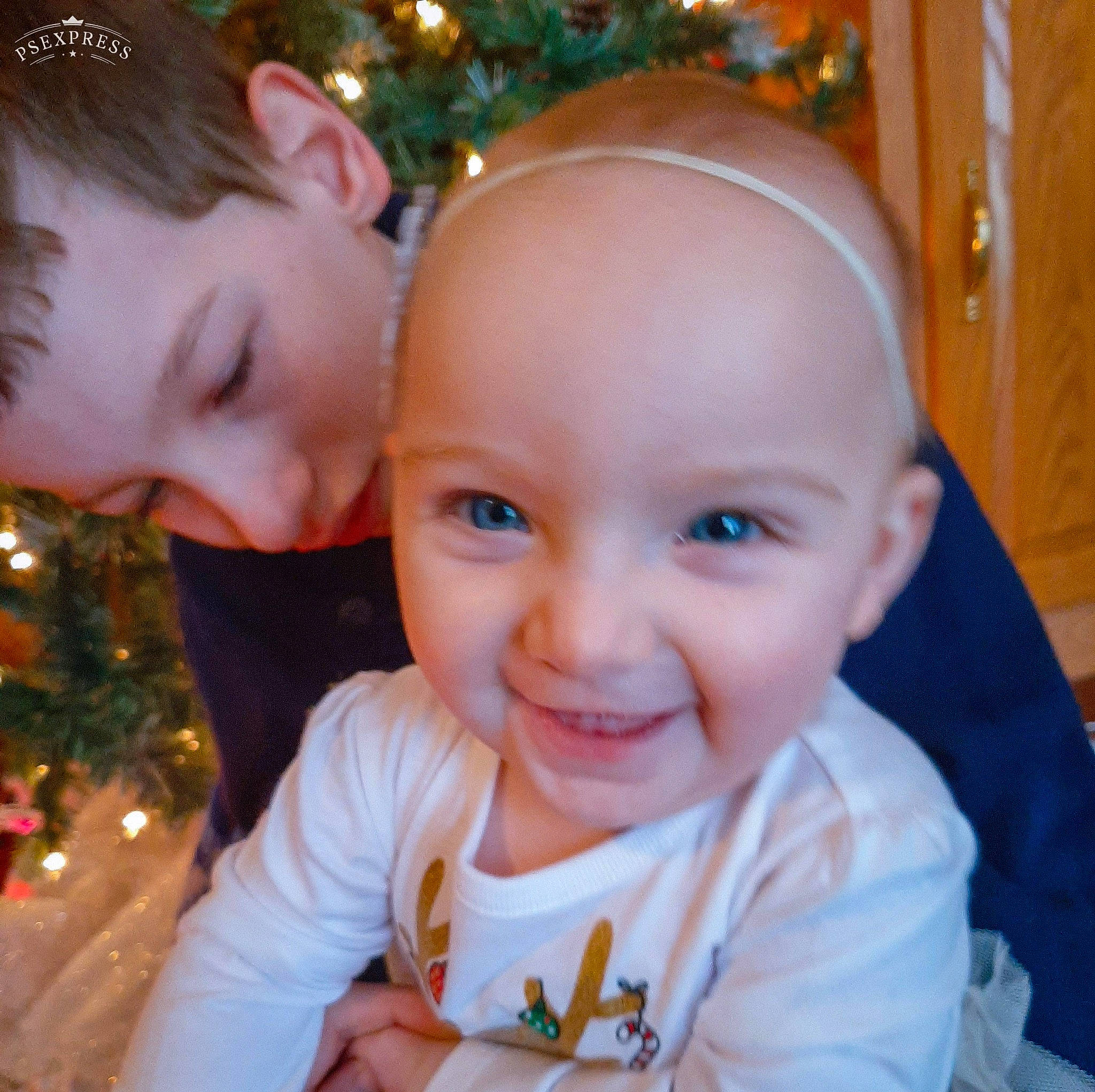 Addalynn joined the competition — help win amazing prizes! baby_toddler_clothing, cheek, child, christmas_decoration, christmas_eve, christmas_ornament, ear, eye, face, facial_expression, forehead, happy, head, holiday, human, iris, joy, mouth, nose, person