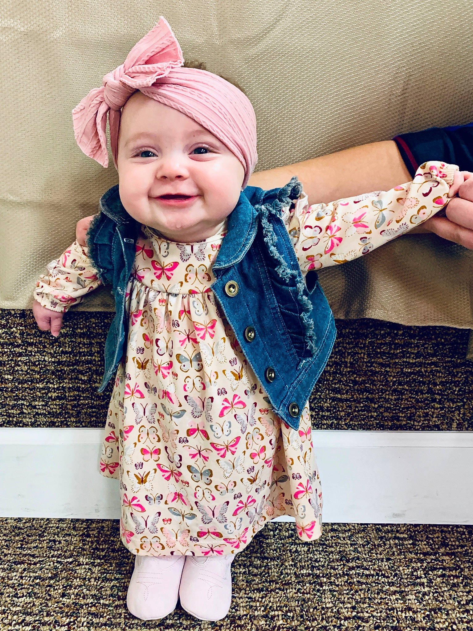 Lainey Rae is registered to the contest to win money with this photo: baby, baby_toddler_clothing, cheek, child, child_model, clothing, design, dress, fashion_accessory, headgear, headwear, jacket, joy, lip, outerwear, pattern, person, pink, skin, sleeve