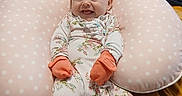 Sommer joined the competition — help win amazing prizes! baby, infant, smile, mittens, onesie, floral_pattern, pillow, polka_dots, blanket, bedroom, furniture, dresser, comfort, cute, happy, indoor, child, person, resting, soft