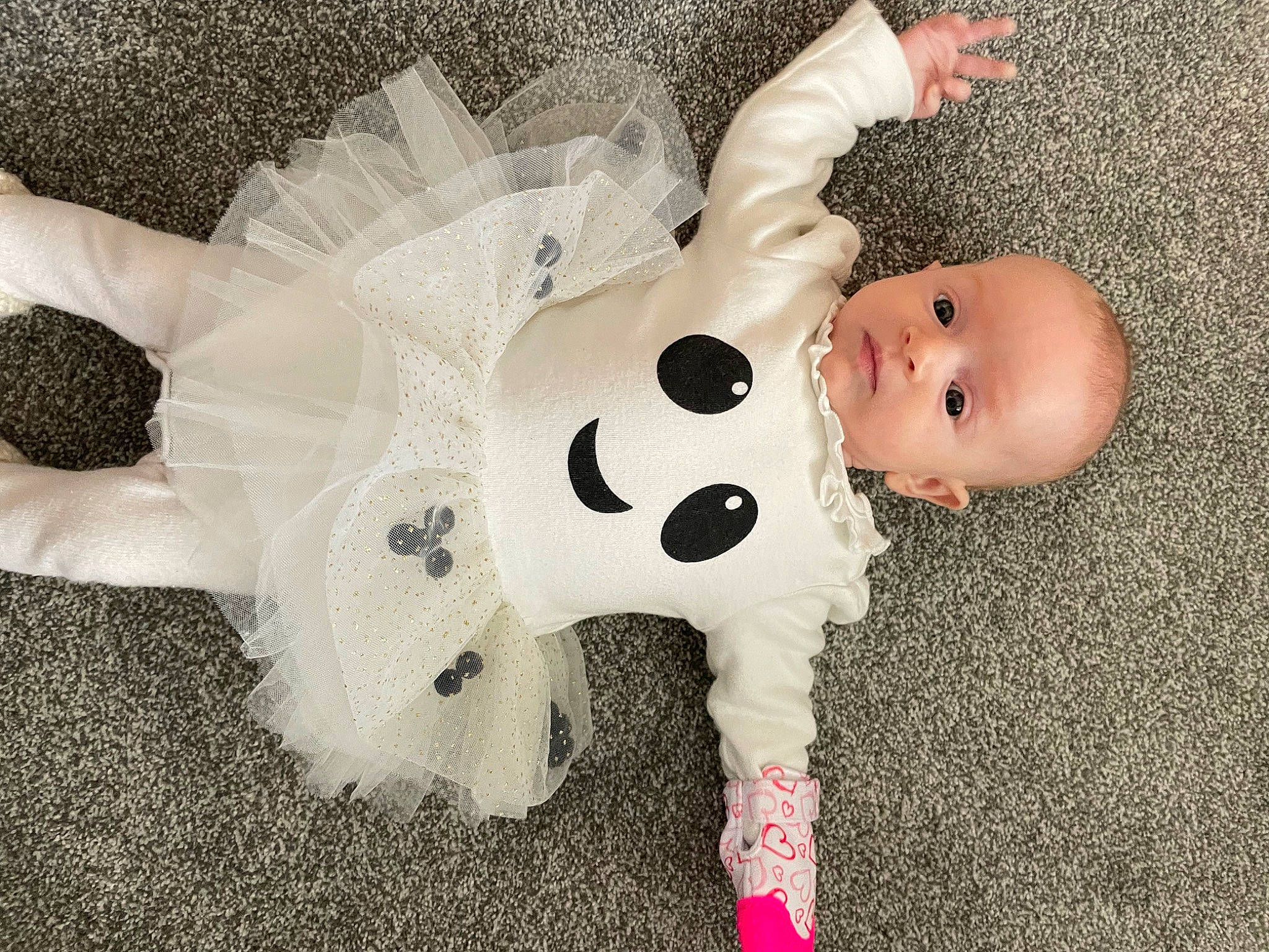Dottie is registered to the contest to win money with this photo: arm, baby, baby_products, baby_toddler_clothing, child, dress, eye, fawn, fur, hand, happy, head, human_body, pattern, person, plush, snout, stuffed_toy, textile, toddler