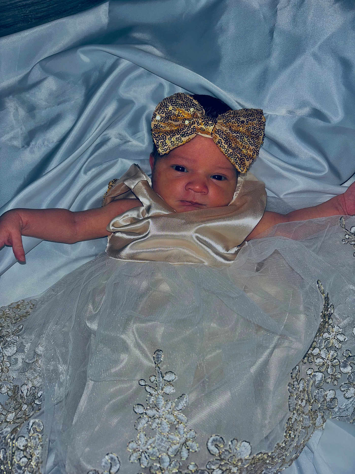 Angel joined the competition — help win amazing prizes! baby, infant, dress, headband, bow, lace, fabric, silk, portrait, newborn, child, cute, clothing, lying_down, person, indoor, soft_texture, decorative, white, gold