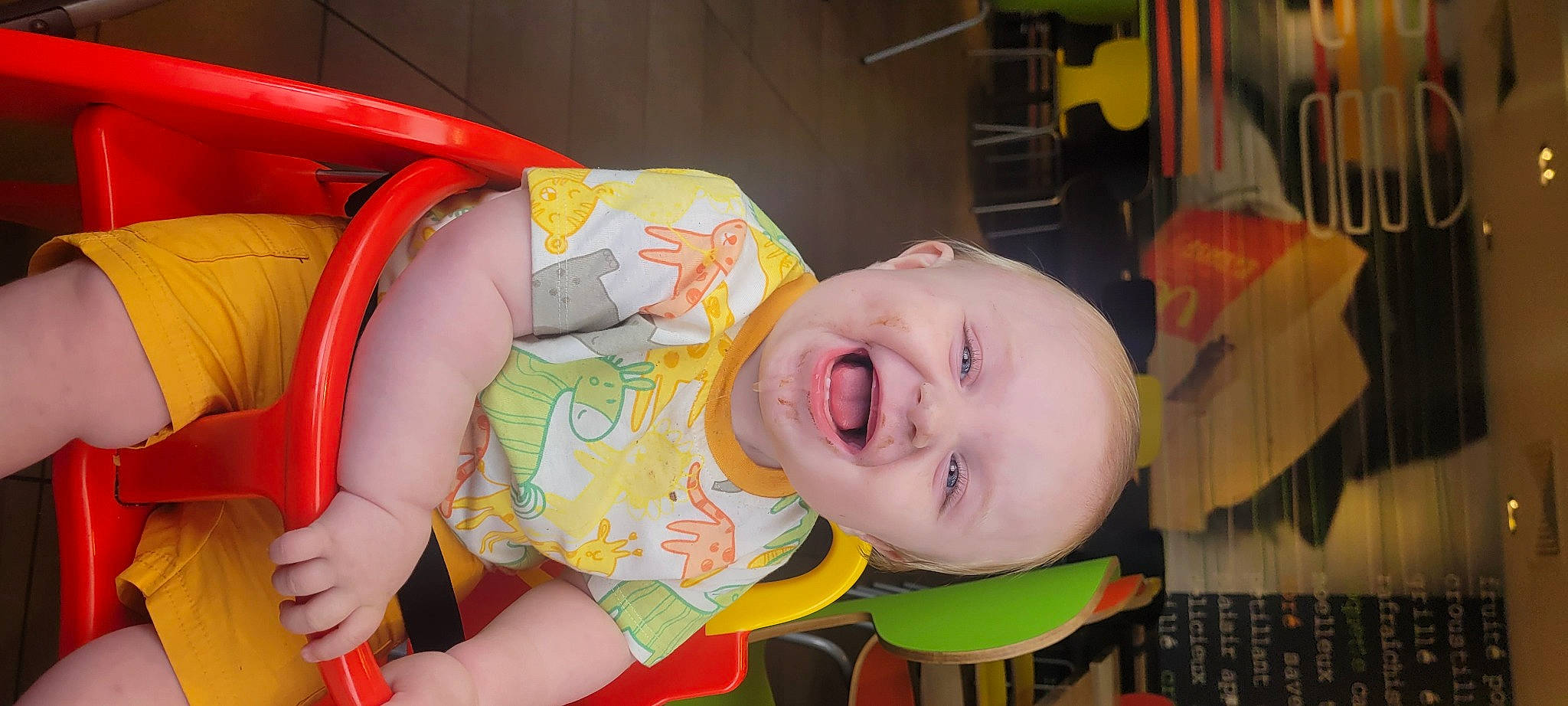 Alessio a rejoint le concours — aidez-le/la à gagner de superbes lots ! baby, baby_laughing, baby_products, baby_toddler_clothing, baby_toys, cheek, child, fun, happy, leisure, mouth, nose, orange, person, play, room, skin, smile, thigh, toddler