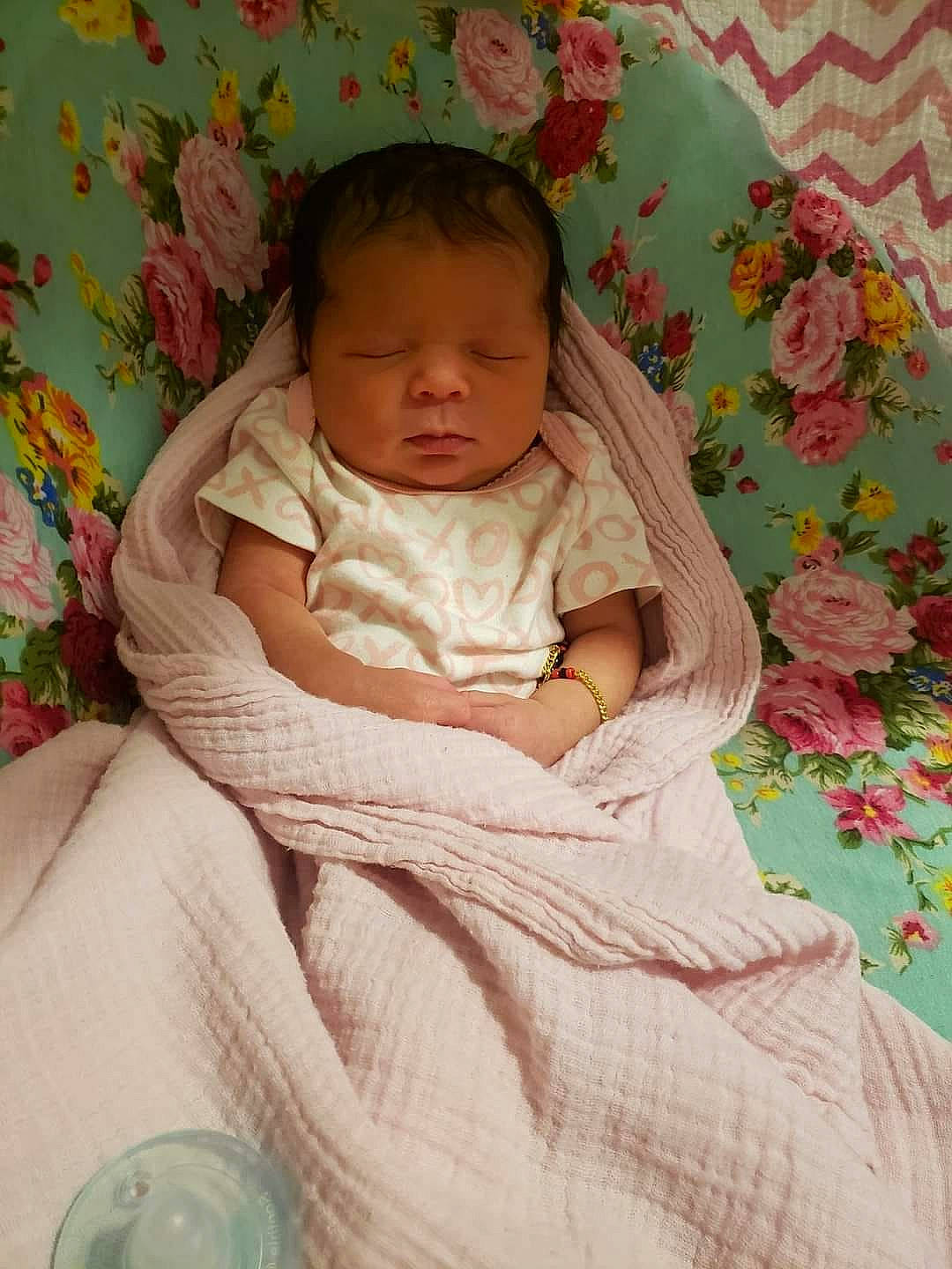 Annalise is registered to the contest to win money with this photo: baby, baby_products, baby_sleeping, baby_toddler_clothing, bedding, bedtime, cheek, child, comfort, iris, linens, nail, pattern, peach, person, pink, room, sitting, skin, textile