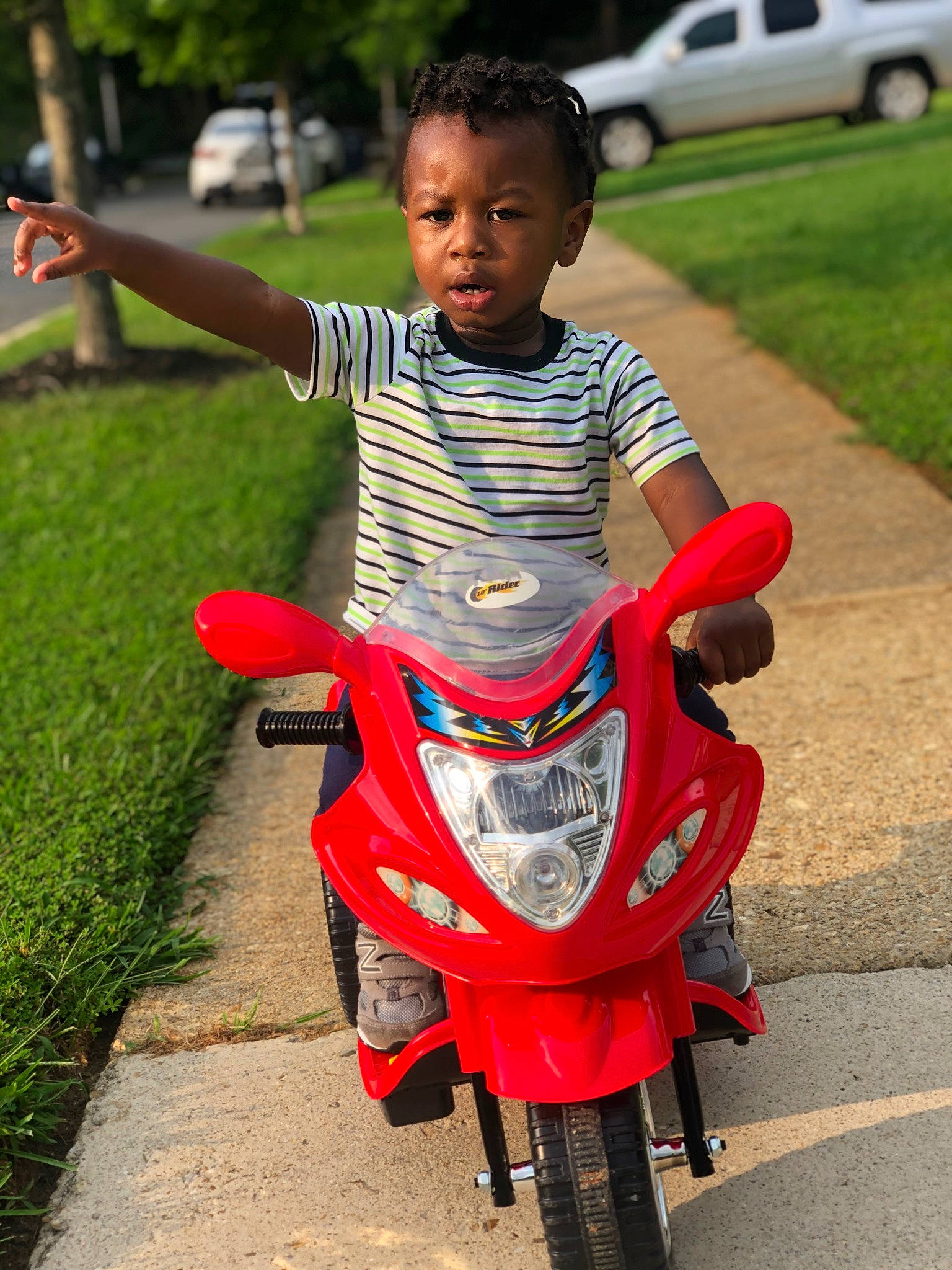 Jamir is registered to the contest to win money with this photo: automotive_design, automotive_lighting, automotive_tire, automotive_wheel_system, bicycle_accessory, car, child, fender, happy, land_vehicle, mode_of_transport, motor_vehicle, person, public_space, recreation, road, street_fashion, tire, travel, vehicle