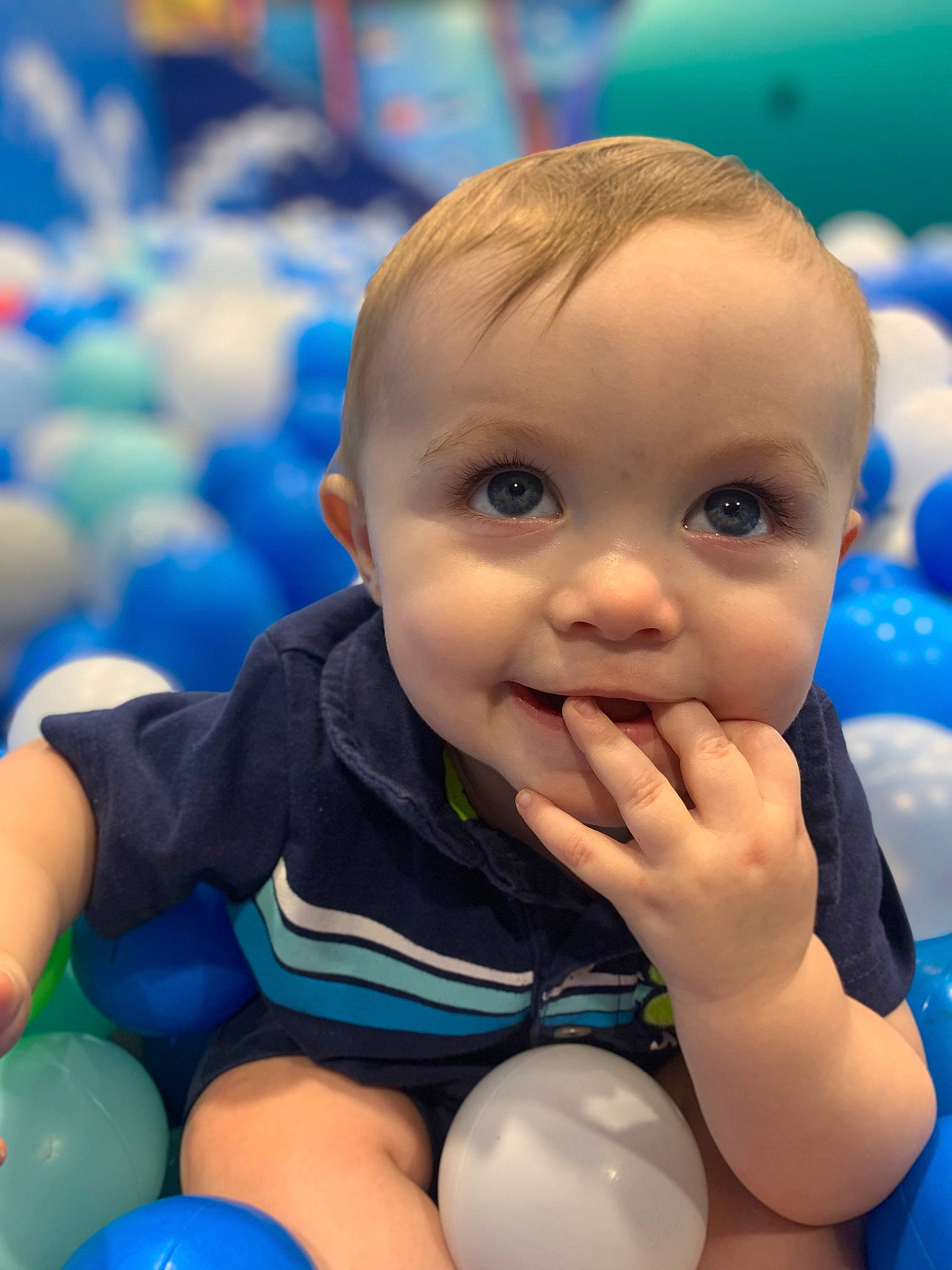 Gatlin joined the competition — help win amazing prizes! arm, baby, ball_pit, blue, cheek, child, electric_blue, fun, gesture, hairstyle, hand, happy, joy, leisure, nose, person, photograph, skin, smile, thumb