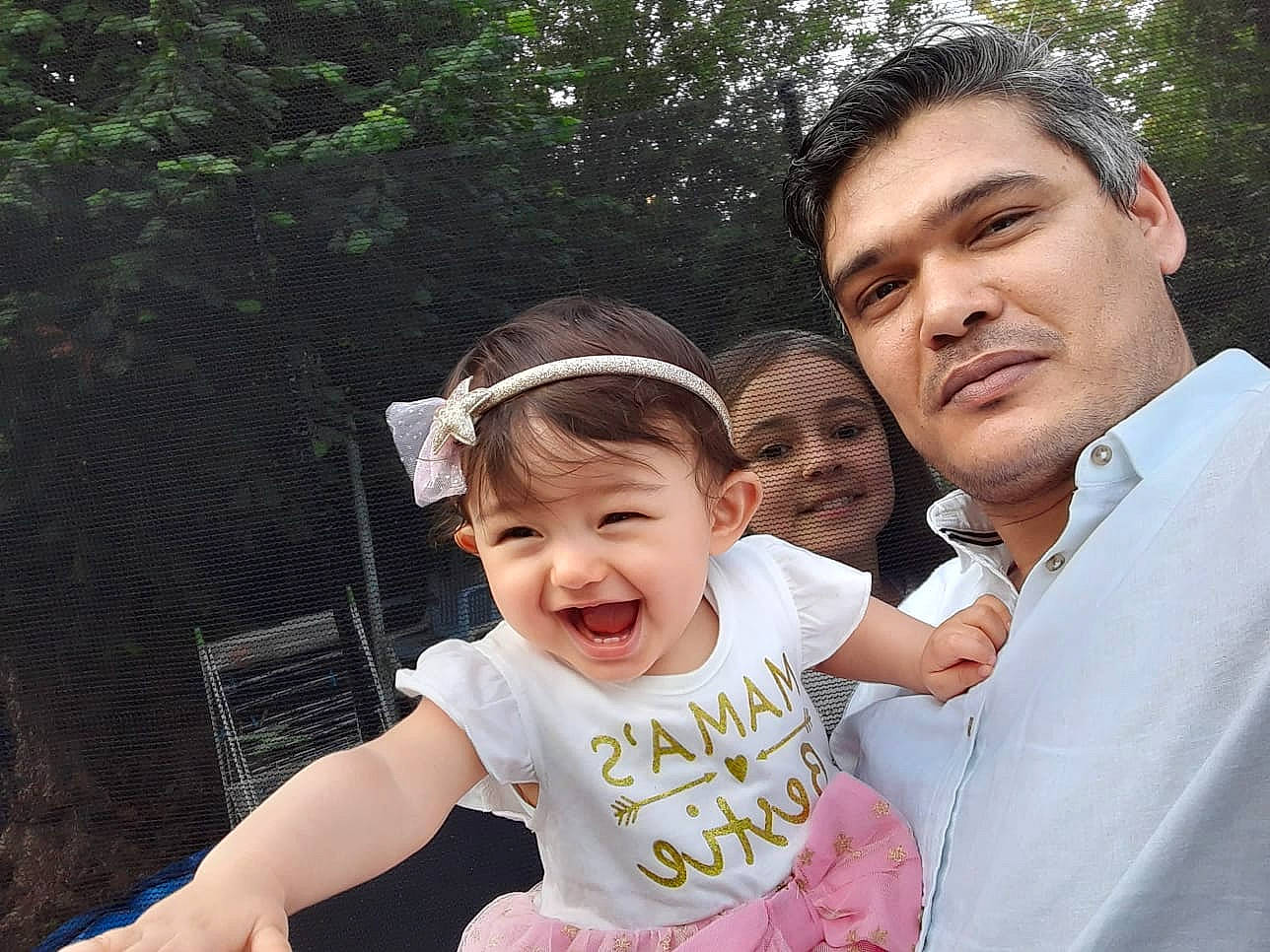 Marie participe au concours pour gagner de l'argent avec cette photo : baby, baby_toddler_clothing, child, event, fashion_accessory, formal_wear, fun, gesture, grass, happy, jewellery, joy, laugh, leisure, people_in_nature, person, pink, recreation, smile, toddler