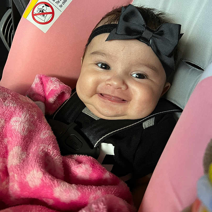 Amiyrah joined the competition — help win amazing prizes! baby, bodypart, boy, cap, child, clothing, cushion, face, finger, hand, happy, hat, head, homedecor, male, people, person, photography, portrait, smile