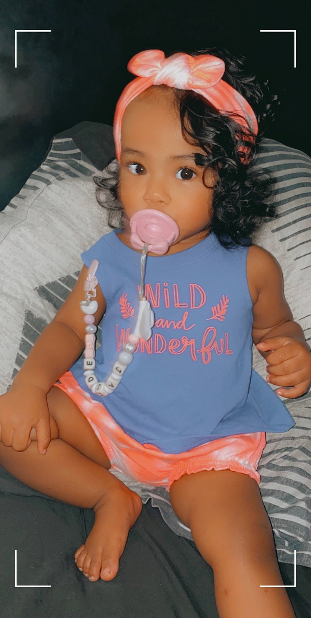 Jaide is registered to the contest to win money with this photo: baby_toddler_clothing, cheek, chin, eye, eyelash, face, finger, hair, hairstyle, happy, head, iris, lip, mouth, neck, nose, person, pink, skin, sleeve