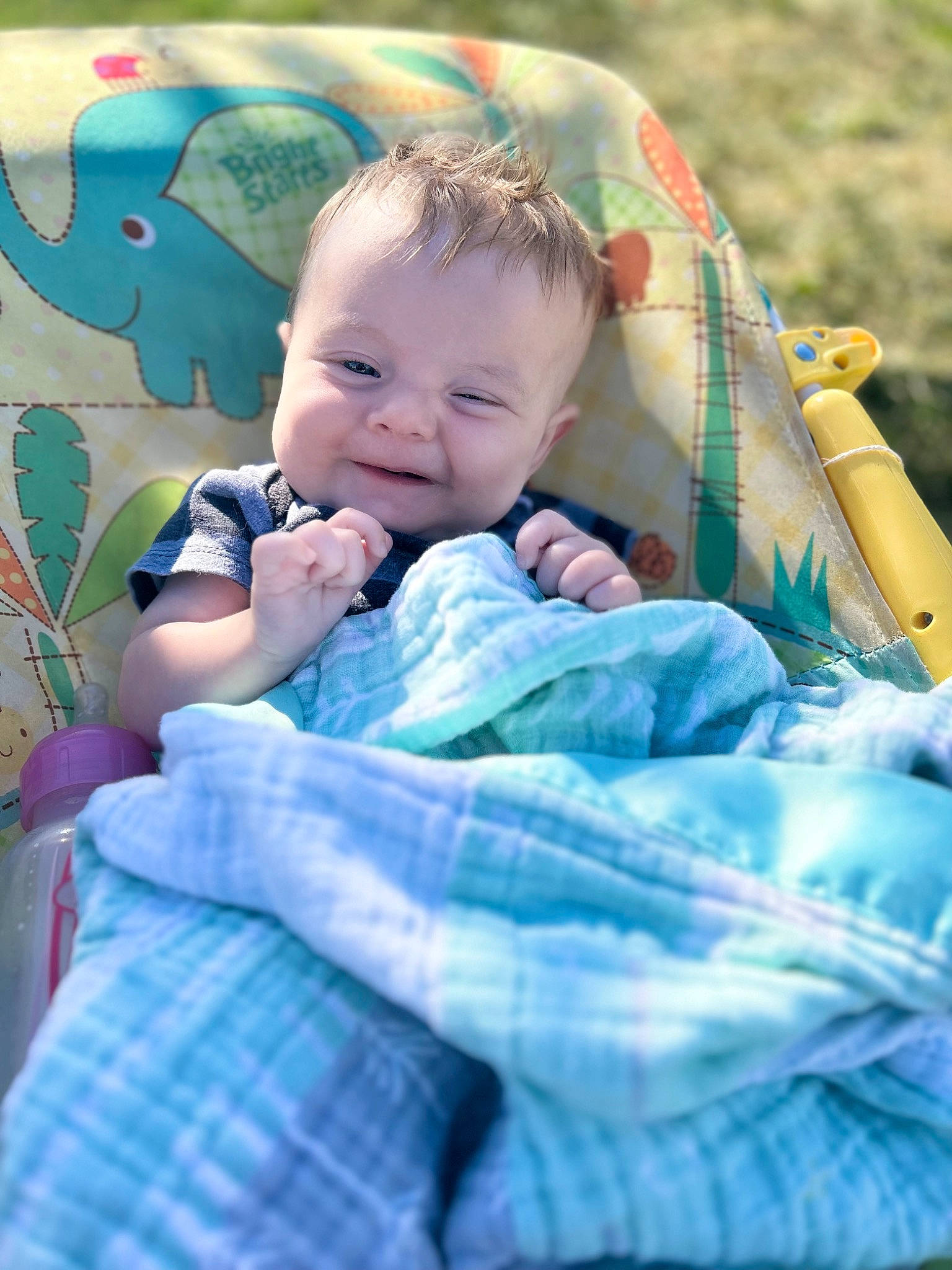 Josephine is registered to the contest to win money with this photo: baby, baby_products, baby_toddler_clothing, blue, child, comfort, event, fun, grass, happy, iris, leisure, pattern, people_in_nature, person, plaid, sitting, skin, smile, tartan