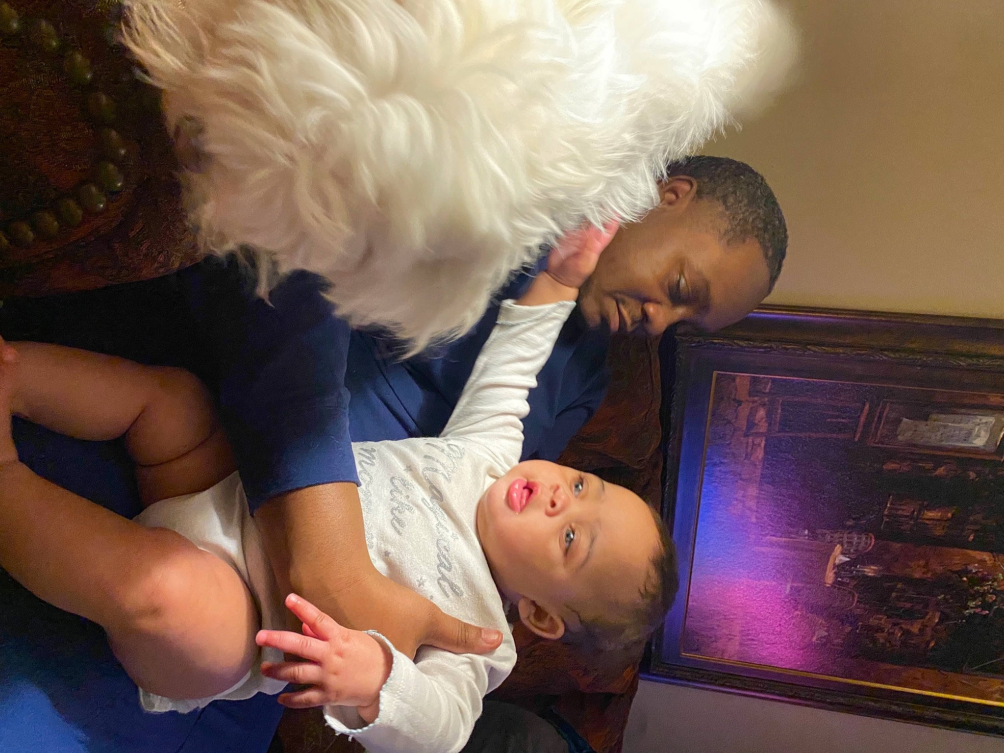 Jada joined the competition — help win amazing prizes! abdomen, baby, child, comfort, display_device, elbow, event, fun, fur, gesture, happy, human_body, love, muscle, person, room, sitting, t_shirt, toddler