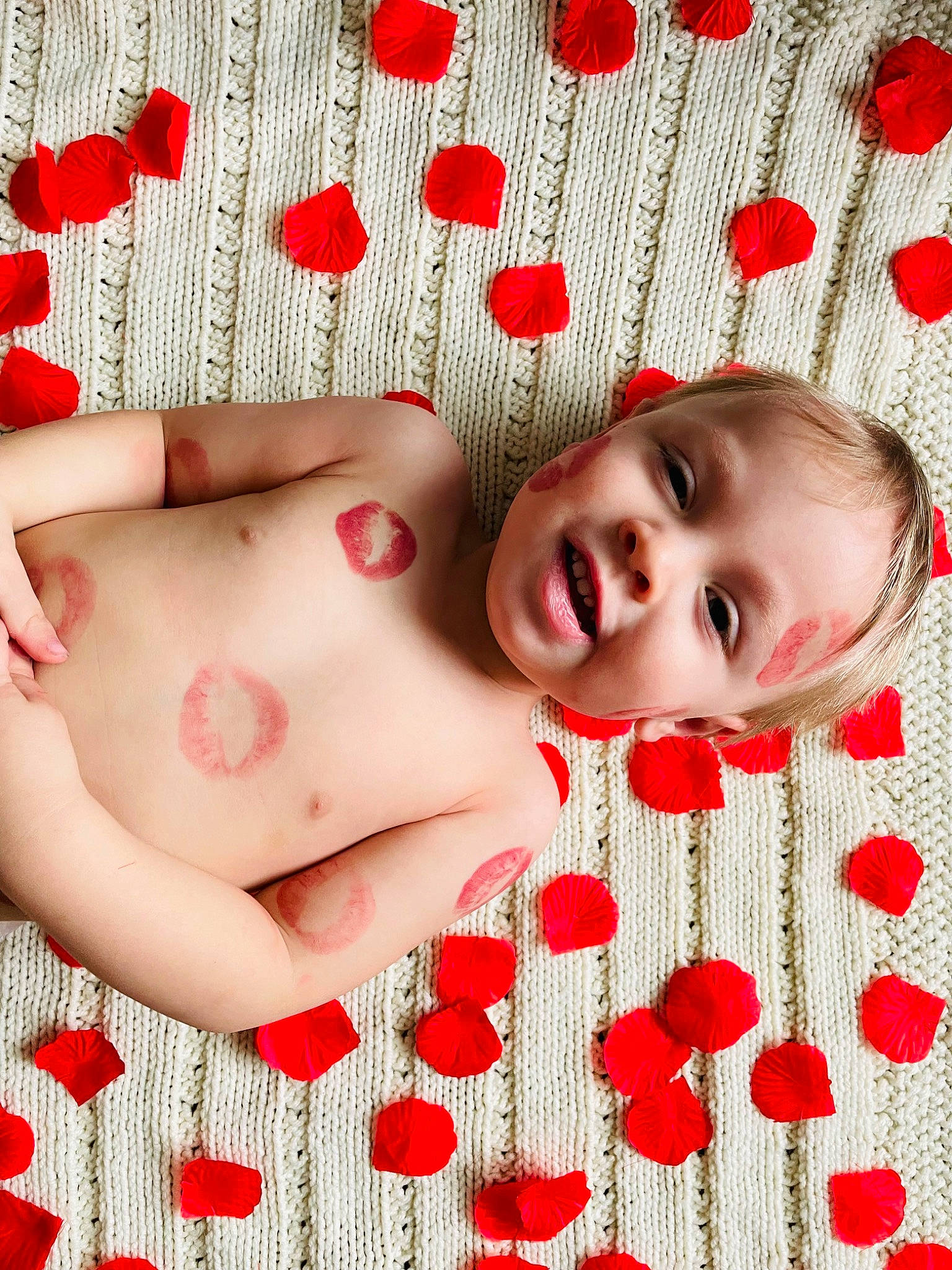 Luka is registered to the contest to win money with this photo: beauty, cheek, chest, child, close_up, facial_expression, happy, human_body, lip, mouth, muscle, pattern, people_in_nature, person, petal, pink, plant, red, skin, smile
