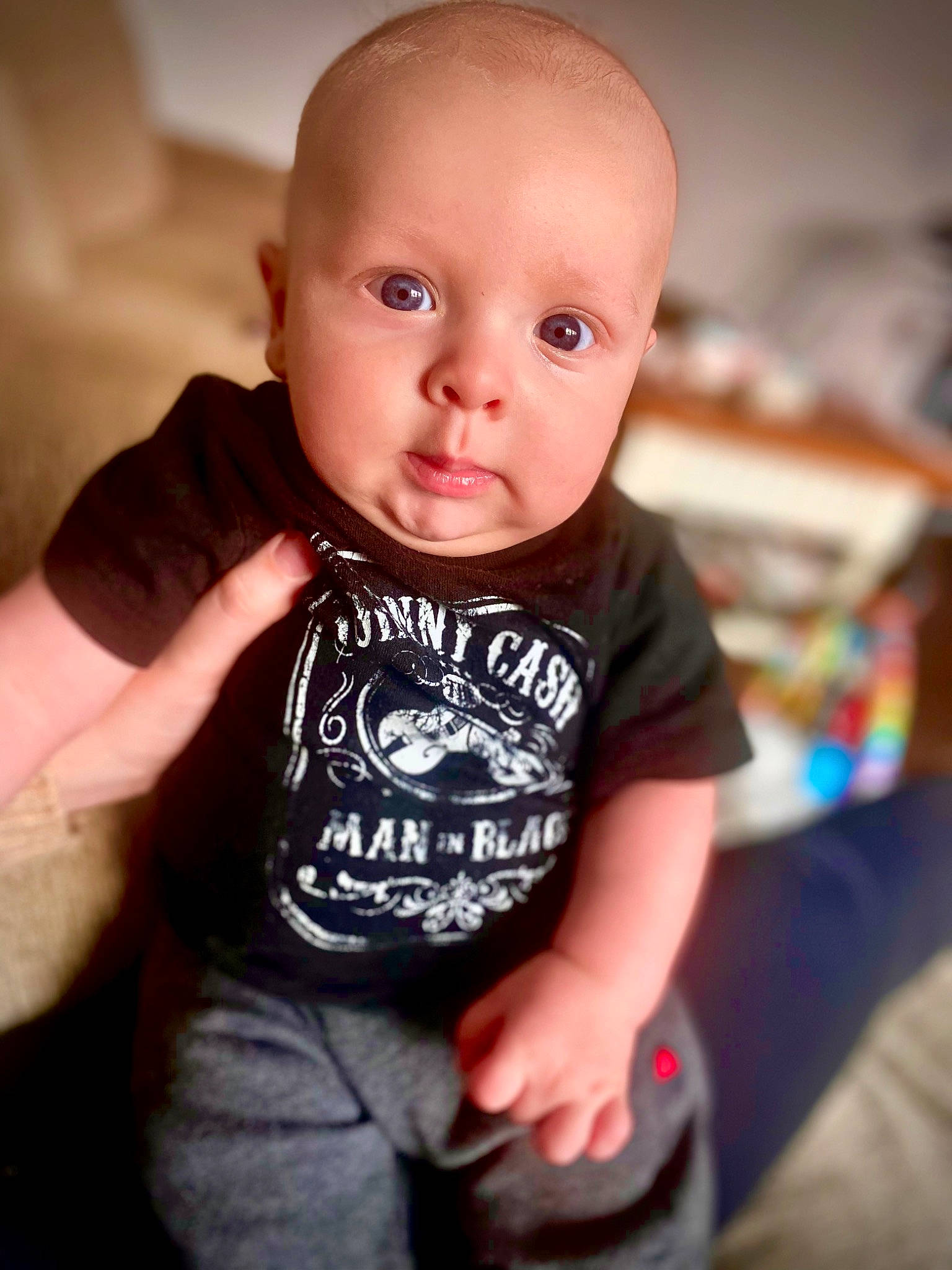 Xavier is registered to the contest to win money with this photo: baby, baby_toddler_clothing, cheek, chin, eye, face, finger, flash_photography, hand, happy, human_body, iris, leg, lip, mouth, neck, nose, person, shoulder, skin