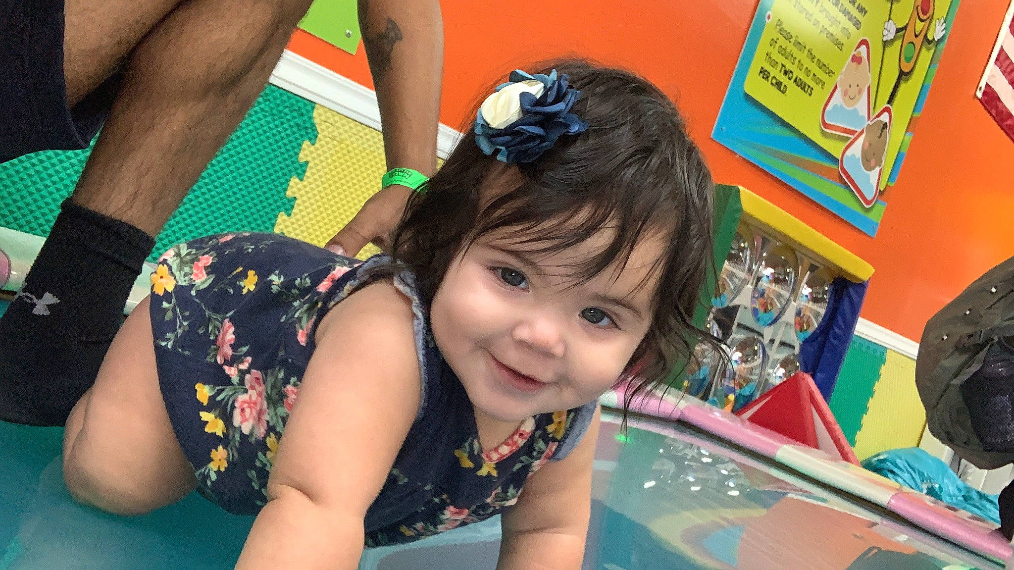 Brianna is registered to the contest to win money with this photo: black_hair, calf, child, event, foot, fun, happy, human_leg, indoor_games_and_sports, joy, kindergarten, knee, leisure, person, play, recreation, smile, snapshot, summer, thigh