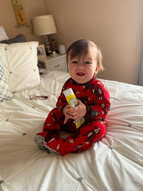 Malikai joined the competition — help win amazing prizes! baby, bedding, child, comfort, linens, person, play, product, room, sitting, smile, textile, toddler