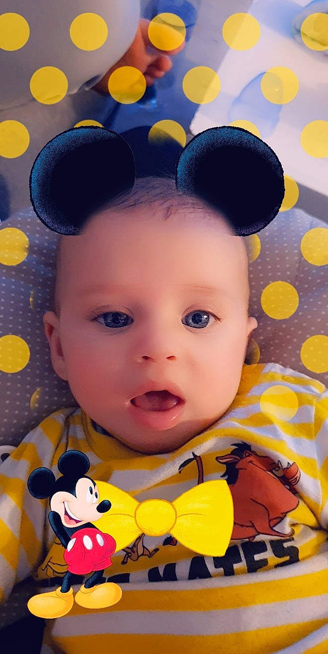 Mattéo participe au concours pour gagner de l'argent avec cette photo : baby_toddler_clothing, blue, cheek, chin, eye, eyebrow, eyelash, face, hairstyle, happy, head, nose, orange, organ, person, photograph, product, skin, surprise, textile