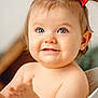 baby, blue_eyes, cheeks, child, clapping, closeup, cute, face, happy, indoors, infant, person, pigtails, portrait, red_bows, skin, smiling, soft_light, teeth, water_droplets