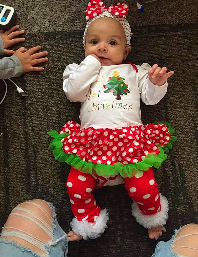 Myla joined the competition — help win amazing prizes! child, christmas, christmas_decoration, christmas_ornament, christmas_stocking, holiday, infant, person, play, product, toddler