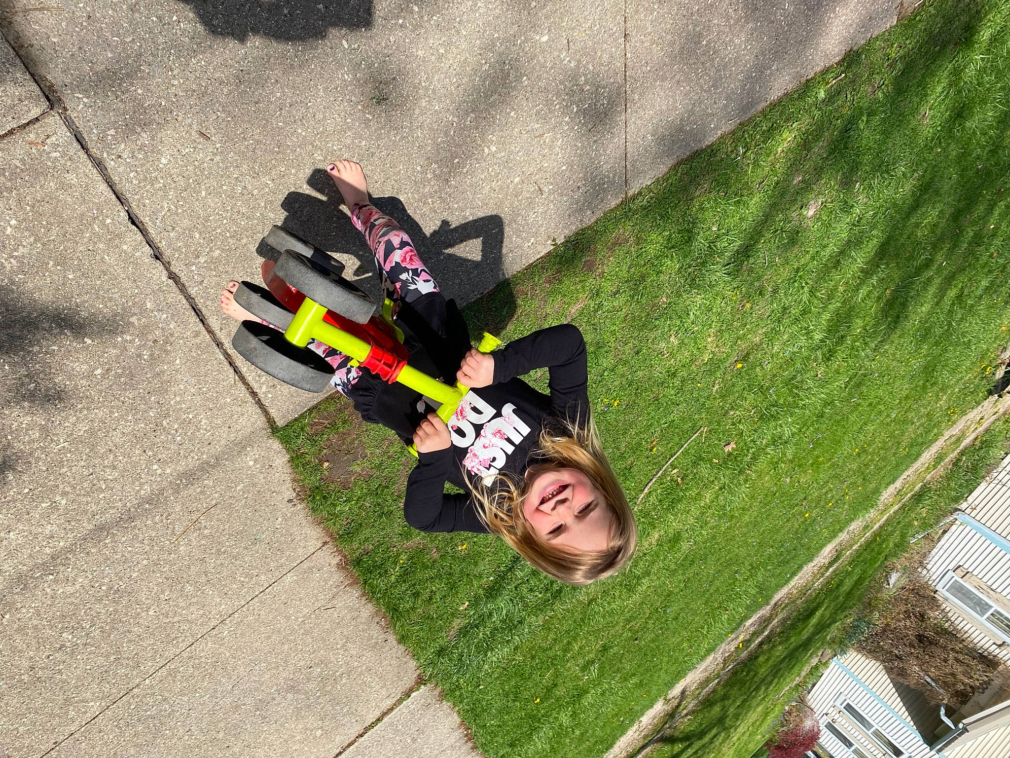 Madalyn is registered to the contest to win money with this photo: asphalt, auto_part, automotive_exterior, automotive_tire, automotive_wheel_system, carmine, fun, grass, joy, landscape, leisure, motor_vehicle, person, personal_protective_equipment, plant, recreation, road_surface, shadow, sidewalk, soil