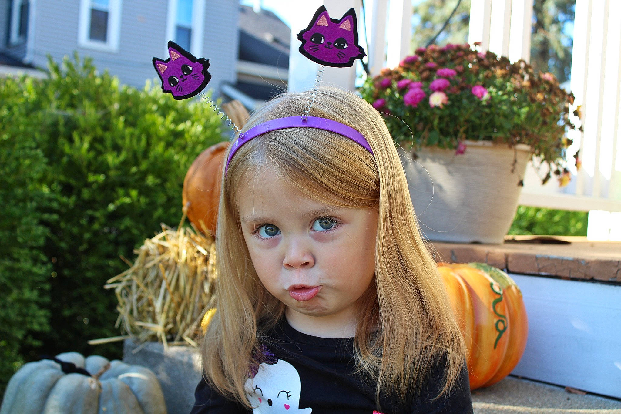 Elaine is registered to the contest to win money with this photo: child, event, fashion_accessory, fawn, flowerpot, fun, grass, green, happy, headpiece, leisure, long_hair, mammal, party_hat, person, photograph, plant, purple, snapshot, summer