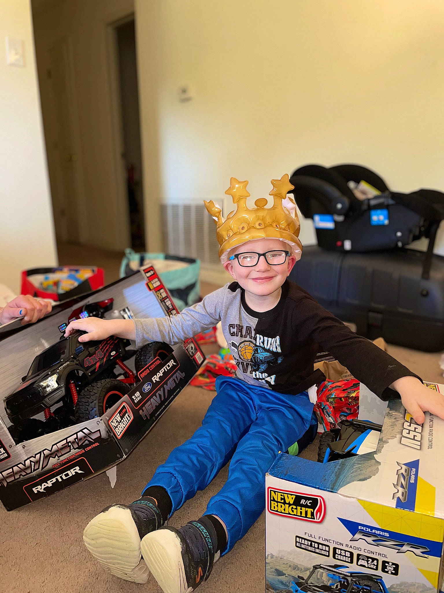 James joined the competition — help win amazing prizes! action_figure, automotive_design, automotive_tire, championship, child, competition_event, fictional_character, figurine, flooring, fun, headwear, helmet, joy, machine, person, personal_protective_equipment, play, racing, recreation, sports