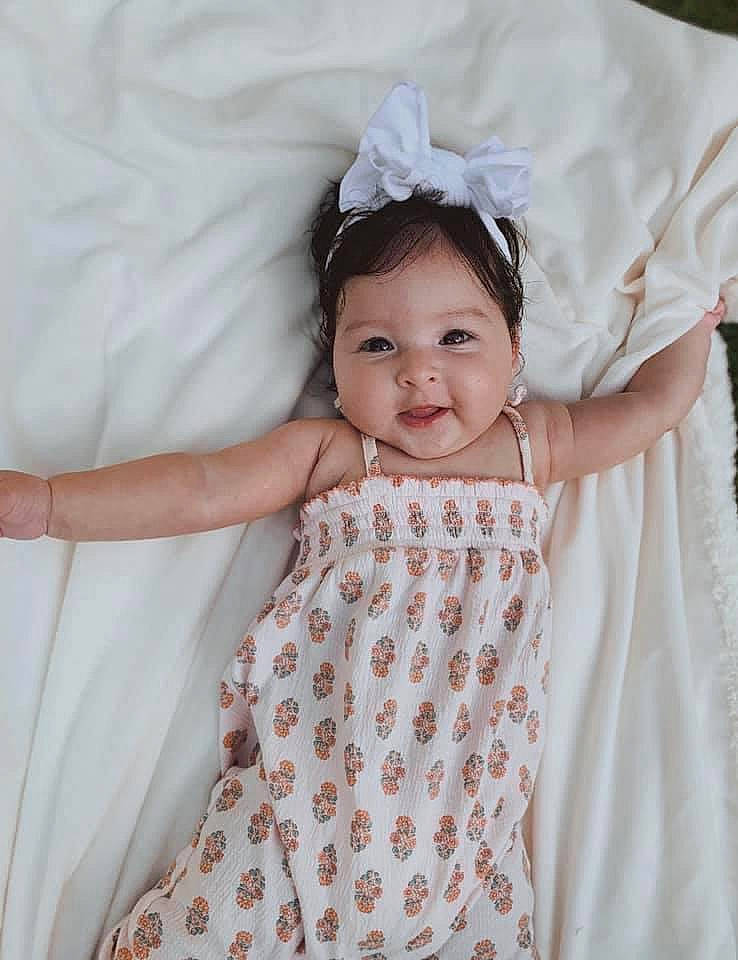 Giavanna joined the competition — help win amazing prizes! baby, baby_toddler_clothing, child, child_model, design, dress, hair_accessory, pattern, person, pink, product, skin, smile, textile, toddler, white