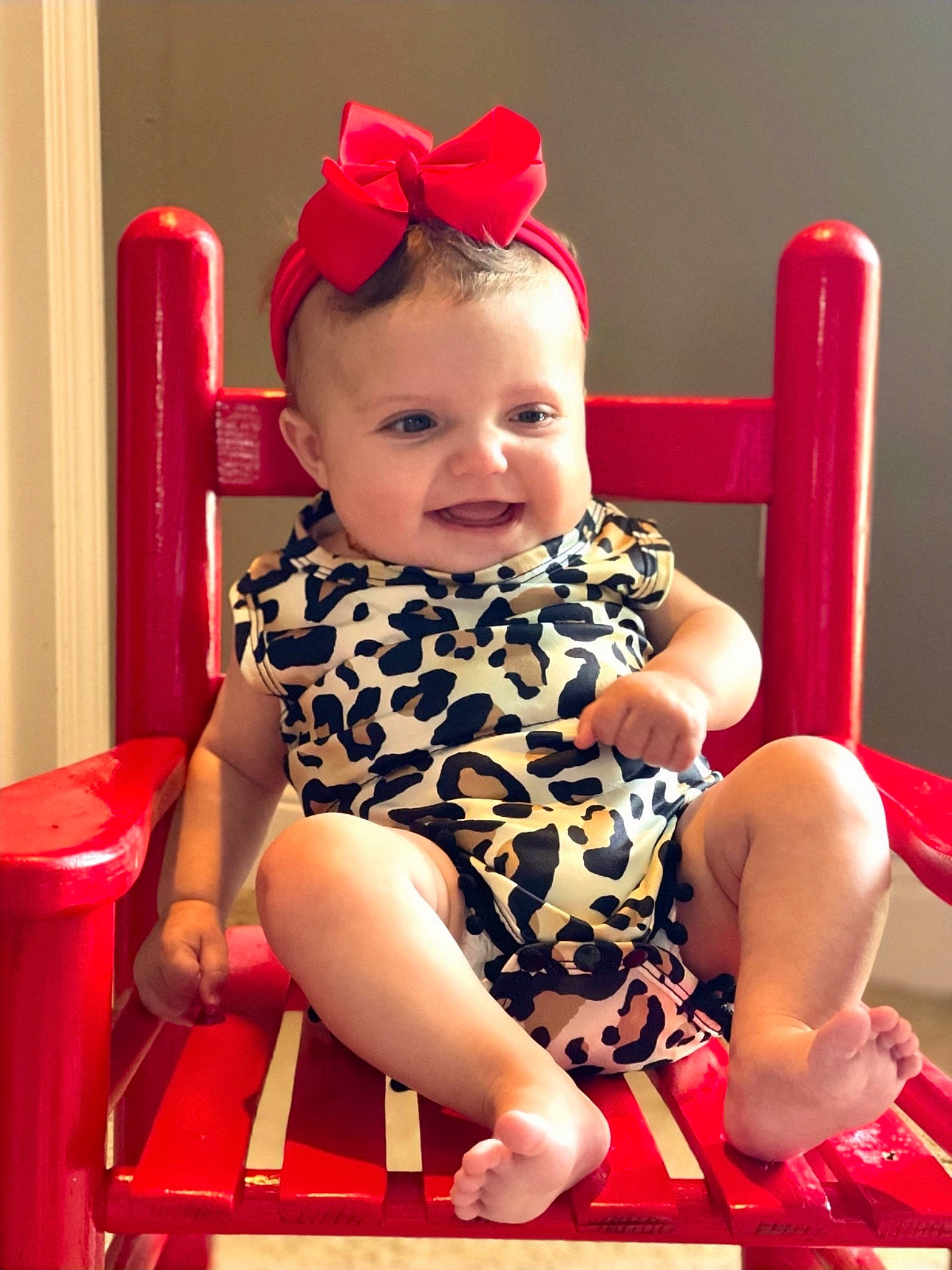Brylee joined the competition — help win amazing prizes! baby, baby_toddler_clothing, child, event, fashion_accessory, fun, happy, hat, headband, human_leg, joy, magenta, pattern, person, pink, red, sitting, smile, standing, thigh