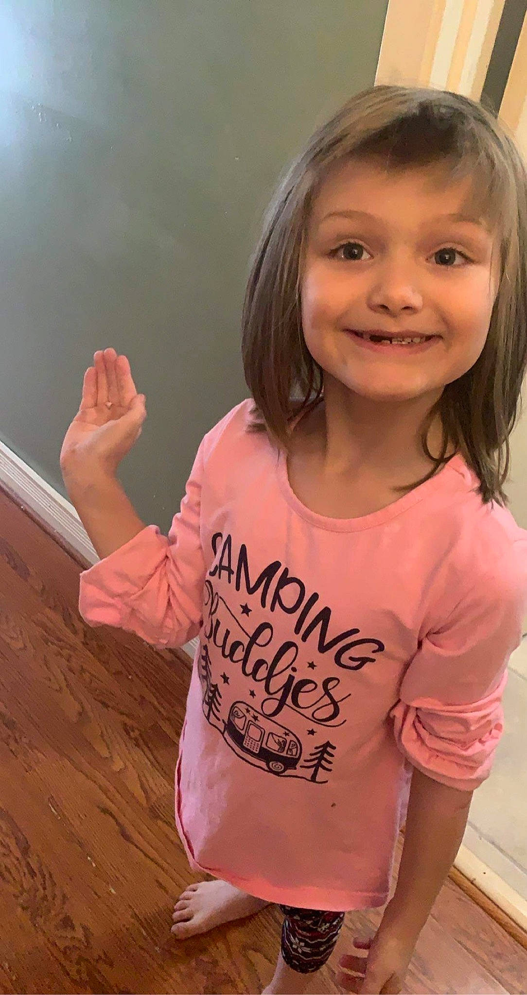 Kameron is registered to the contest to win money with this photo: cheek, face, facial_expression, fun, gesture, hair, hairstyle, happy, human_body, joy, neck, organ, person, pink, shoulder, skin, sleeve, smile, standing, t_shirt