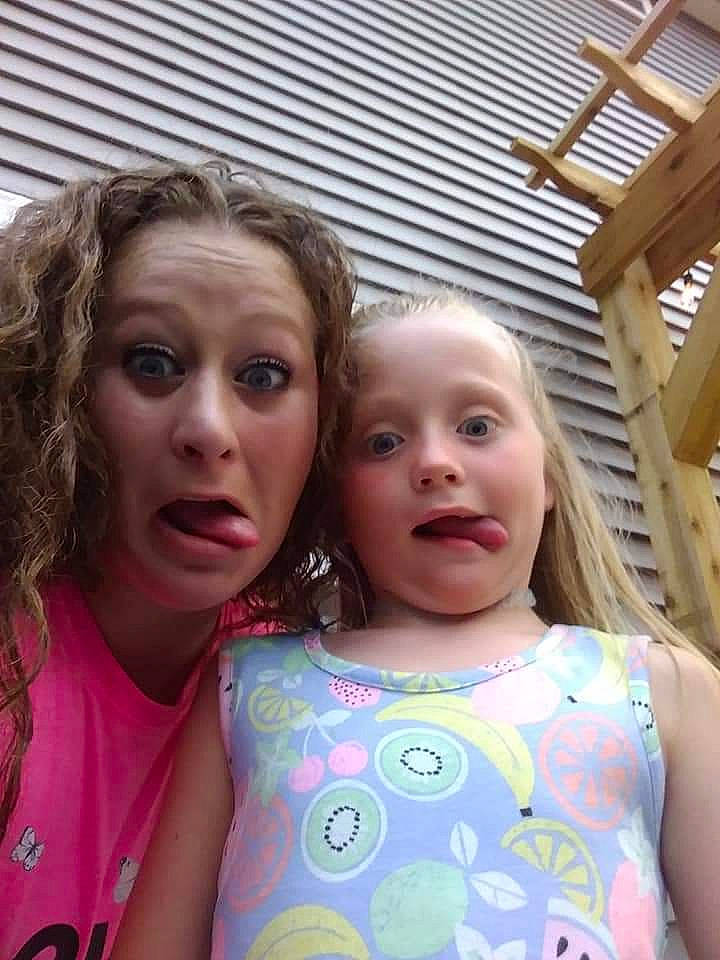 Lainey is registered to the contest to win money with this photo: active_tank, baby_toddler_clothing, blond, brown_hair, clothing, day_dress, eye, eyelash, lip, mouth, neck, nose, person, sleeveless_shirt, surprise, throat