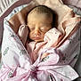 Milah joined the competition — help win amazing prizes! newborn, baby, sleeping, pink_blanket, wrapped, infant, cozy, soft_fabric, cute_pattern, peaceful, child, tied_bow, indoors, portrait, closeup, head, face, sleepwear, resting, adorable