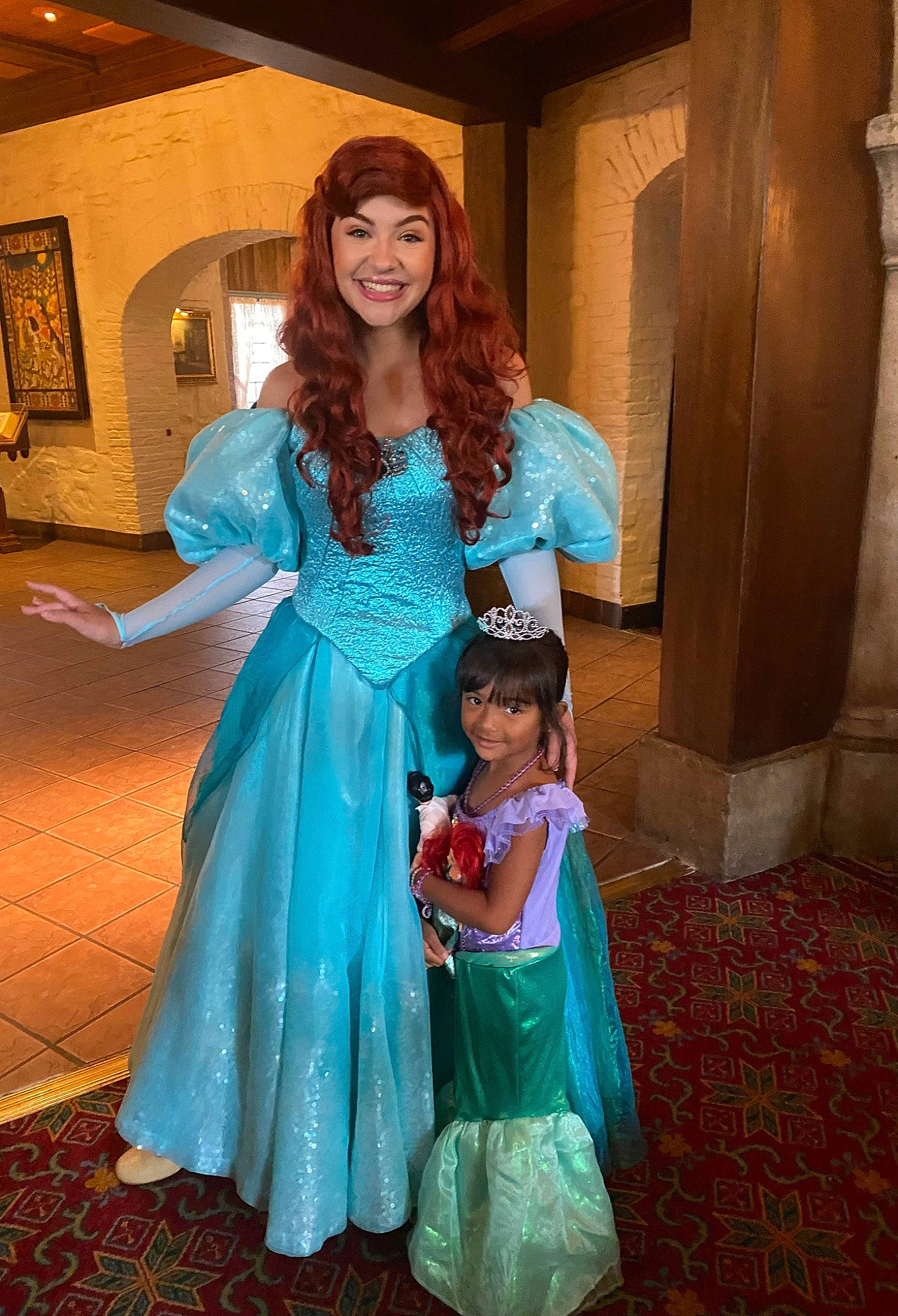 Christiana is registered to the contest to win money with this photo: abdomen, costume, dress, electric_blue, event, fashion_design, flooring, formal_wear, fun, gown, happy, joy, long_hair, magenta, makeover, peach, person, skin, smile, toddler