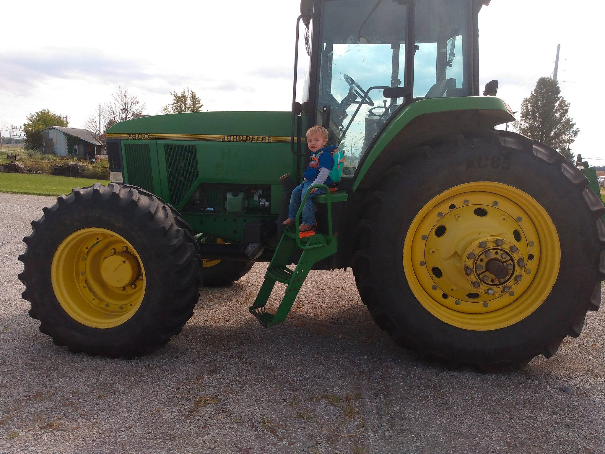 Caspian is registered to the contest to win money with this photo: agricultural_machinery, auto_part, automotive_tire, automotive_wheel_system, car, land_vehicle, motor_vehicle, person, rim, rolling, soil, tire, tractor, tread, vehicle, wheel