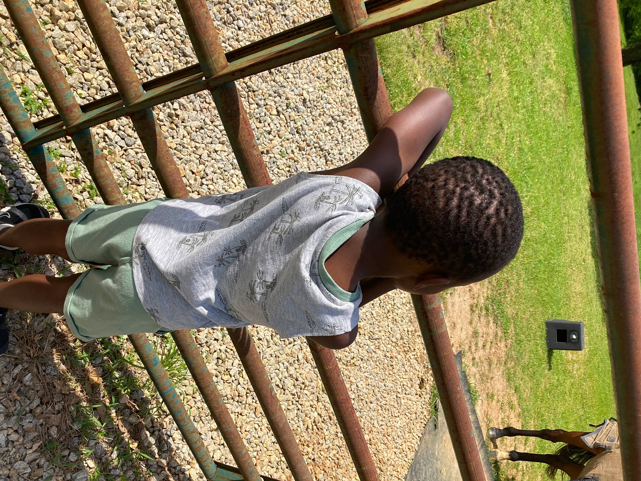 Micheal joined the competition — help win amazing prizes! fence, grass, hat, human_body, human_leg, leg, leisure, mammal, mesh, metal, pattern, people_in_nature, person, plant, shadow, shoe, soil, tints_and_shades, tree, vertebrate